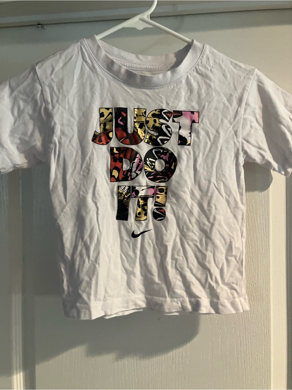 Nike White Kids' Short-Sleeve Tee with Multi-Color 'Just Do It' Graphic